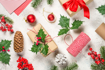 Wrapping christmas presents on white.