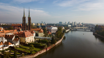 Fototapeta na wymiar Aerial view of Wroclaw on a sunny misty autumn morning