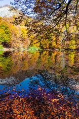 Beautiful lake in the autumn high in the mountains