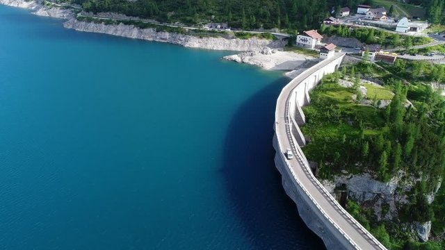 Lago Fedaia (Fedaia lake), an artificial lake and a dam near Canazei, located at the foot of Marmolada massif, as seen from Viel del Pan refuge, Dolomites, Trentino, province of Belluno, Italy