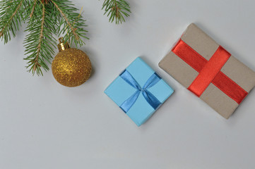boxes with New Year's gifts on a light background