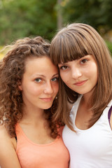 Obraz premium Portrait happy young and attractive girlfriends
