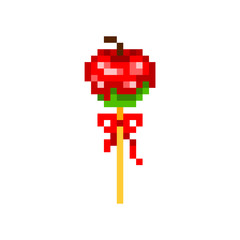 Pixel art green candy apple covered in red caramel on a stick decorated with ribbon bow isolated on white. 8 bit funfair, autumn festival, harvest market,  Halloween party treat. Sweet fruit dessert.