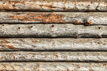texture of logs, masonry coupling of wooden logs with cuts. Copy Space, Wooden Background.