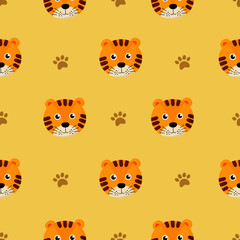 cute seamless pattern with cartoon tigers for kids. animal on yellow background. vector illustration. 