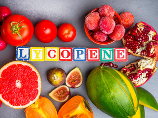 Fruits and vegetables containing lycopene. Healthy vegan food background. Lycopene is a red carotenoid pigment