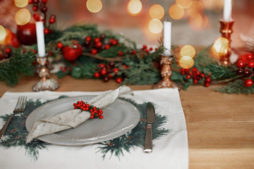 Beautiful festive table setting for Christmas dinner at home