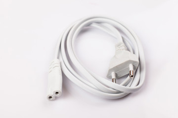 Electrical power cable with European plug. Object is isolated on white background.