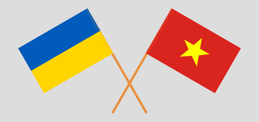 Crossed flags of the Ukraine and Vietnam