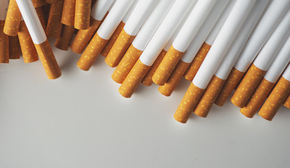 Close up of a smoking cigarettes . cigarette filter tubes © VlaDee