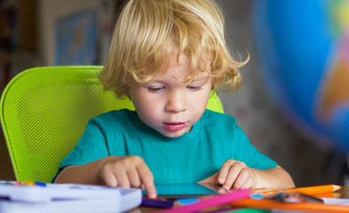 Preschooler with a tablet computer