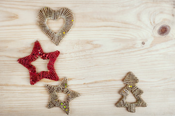 Christmas tree and toys on wooden background. Happy New Year and Christmas greeting card. Winter holidays concept. Top view, copy space 
