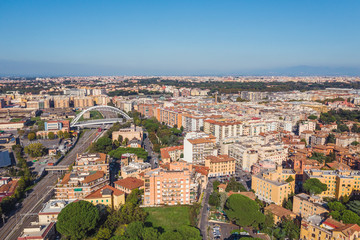 Fototapeta na wymiar Residential area with buildings in Rome, Italy. Many orange and yellow houses, Aerial view from drone.