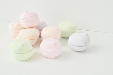 Air marshmallows in pastel shades. A gentle marshmallows.  Marshmallows that you want to eat. A gentle zephyr on a white background. Marshmallows in a light key.