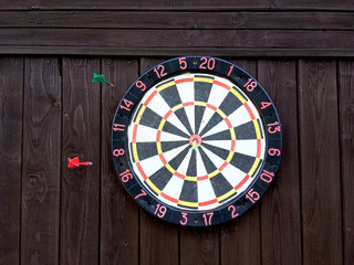 game Darts on a brown background boards