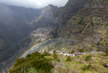 Rainbow over Valley of the Nuns, Curral das Freiras on Madeira Island, Portugal