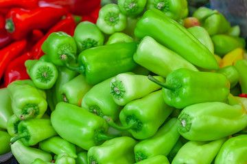 Green and Red fresh peppers from market.