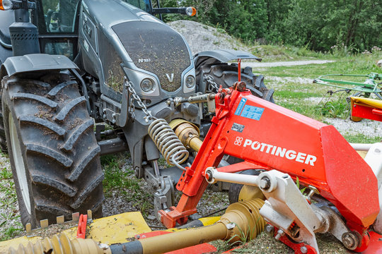 08 August 2019, Schwangau, Germany: Close-up of Valtra tractor and Pottinger equipment detail