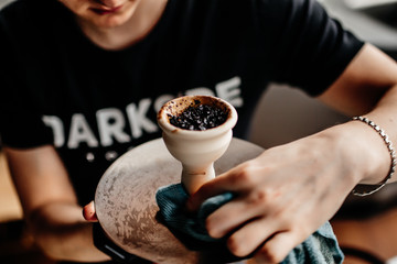 Hookah fan inflates the coals for a hookah