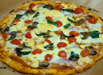 fresh handmade pizza. Italian dish on thin dough made at home