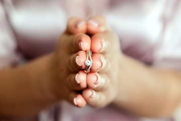 Wedding rings.Wedding rings in hands. The concept of marriage, family relationships, wedding...
