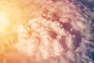 Blue cloudy sky, view from the airplane window. Aerial view of cloudscape