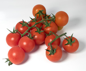 Cherry tomatoes on white background. 