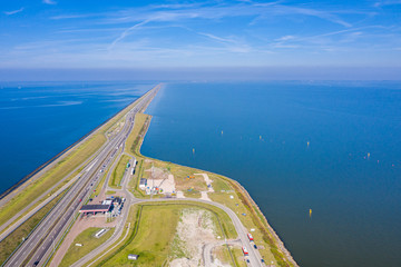 Afsluitdijk, a major dam and causeway in the Netherlands, runs from Den Oever in North Holland to village of Zurich in Friesland province, damming off the Zuiderzee, salt water inlet of the North Sea.