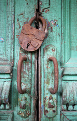 iron lock and handles on the double doors
