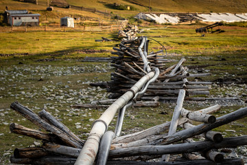 Rudimentary pipeline conducting hot water to the Tsenher Hot Springs in Mongolia