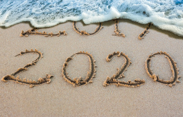 New Year 2020 replace 2019 on beach