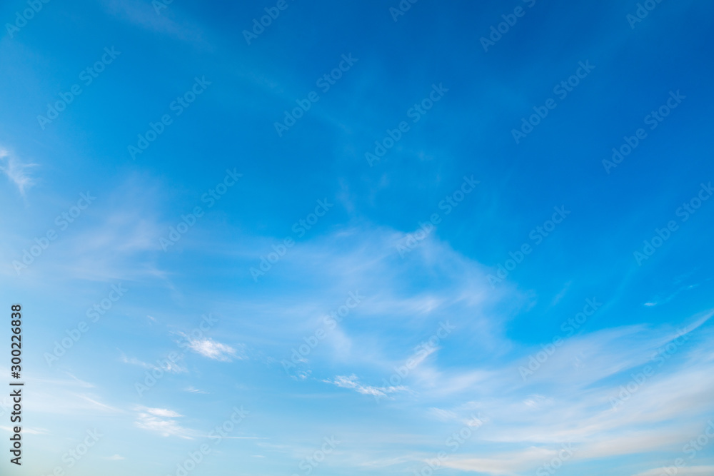 Wall mural blue sky with white clouds.