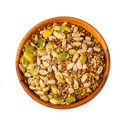 Bowl with mixed seeds for healthy eating on a white background