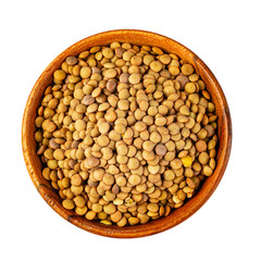 Pile with lentil grains on a white background