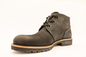 vintage black boots on white background, retro shoes
