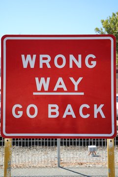 Road sign in Australia "WRONG WAY - GO BACK"