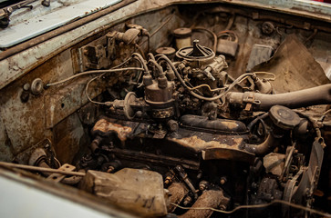 Fototapeta na wymiar Concept: Rusty old car engine bay