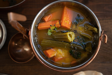 Sambar, traditional south Indian lentil gravy with carrots and moringa drumsticks