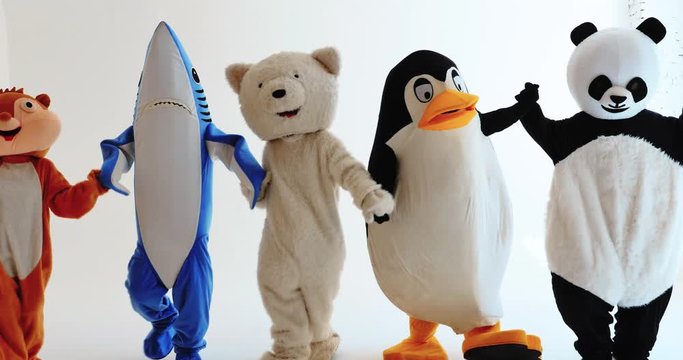 Polar bear and animal mascots characters with a message for humanity, about global warming and pollution problems on our planet
