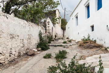 Fototapeta na wymiar Old narrow street of Chora Sfakion town, Southern part of Crete island, Greece