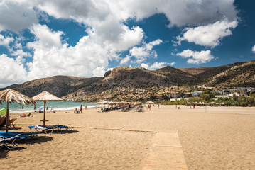 Fototapeta na wymiar Sandy beach of Palaiochora town, Crete island, Greece