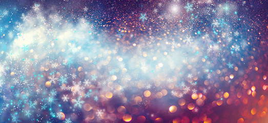Christmas and New Year glittering winter snow flakes swirl bokeh background, backdrop with...