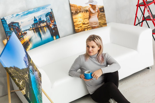 woman in studio with photo canvas