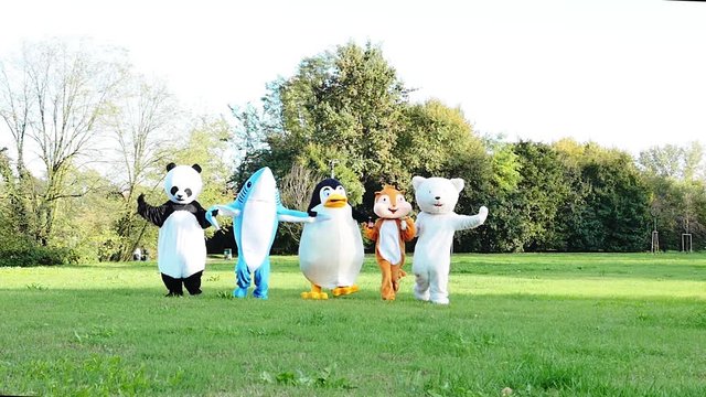 Group of mascots doing party. Concept about carnival, animals rights and lifestyle
