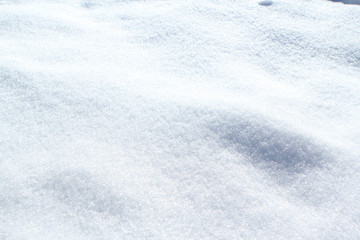 sparkling texture of natural white snow in winter