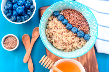 buckwheat porridge with fruits, the concept of a healthy breakfast, diet, veganism, vitamins