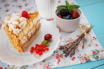 Homemade cake with macaroon and nuts, food background
