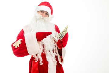 Santa Claus holding money. Isolated.