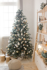 Christmas tree. decorated Christmas tree lights up. new year's interior. new year. Christmas