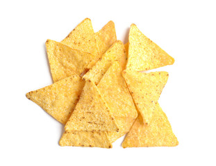 Tasty Mexican nachos chips on white background, top view
